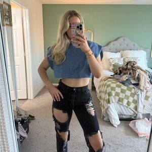 Black distressed mid rise jeans